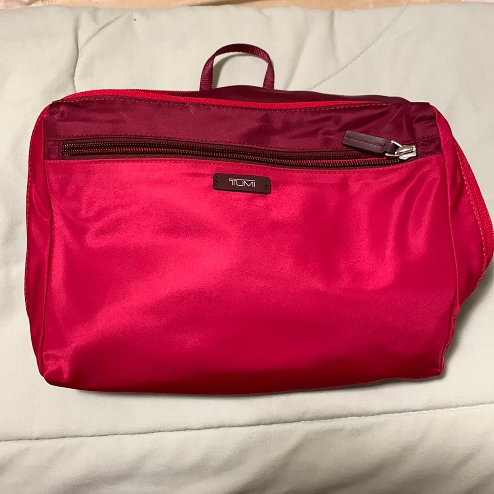 Tumi lightweight backpack can fold into a small pouch for travelling.